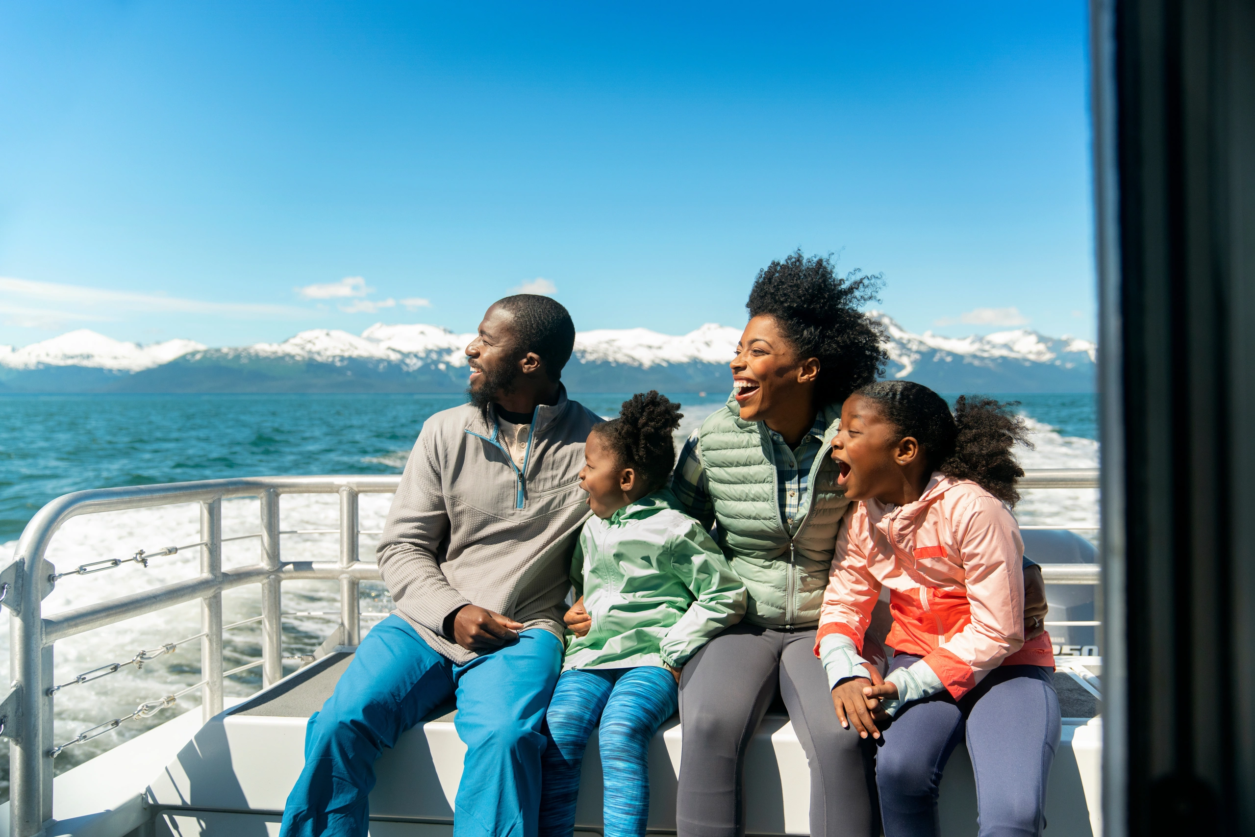Family watching whales