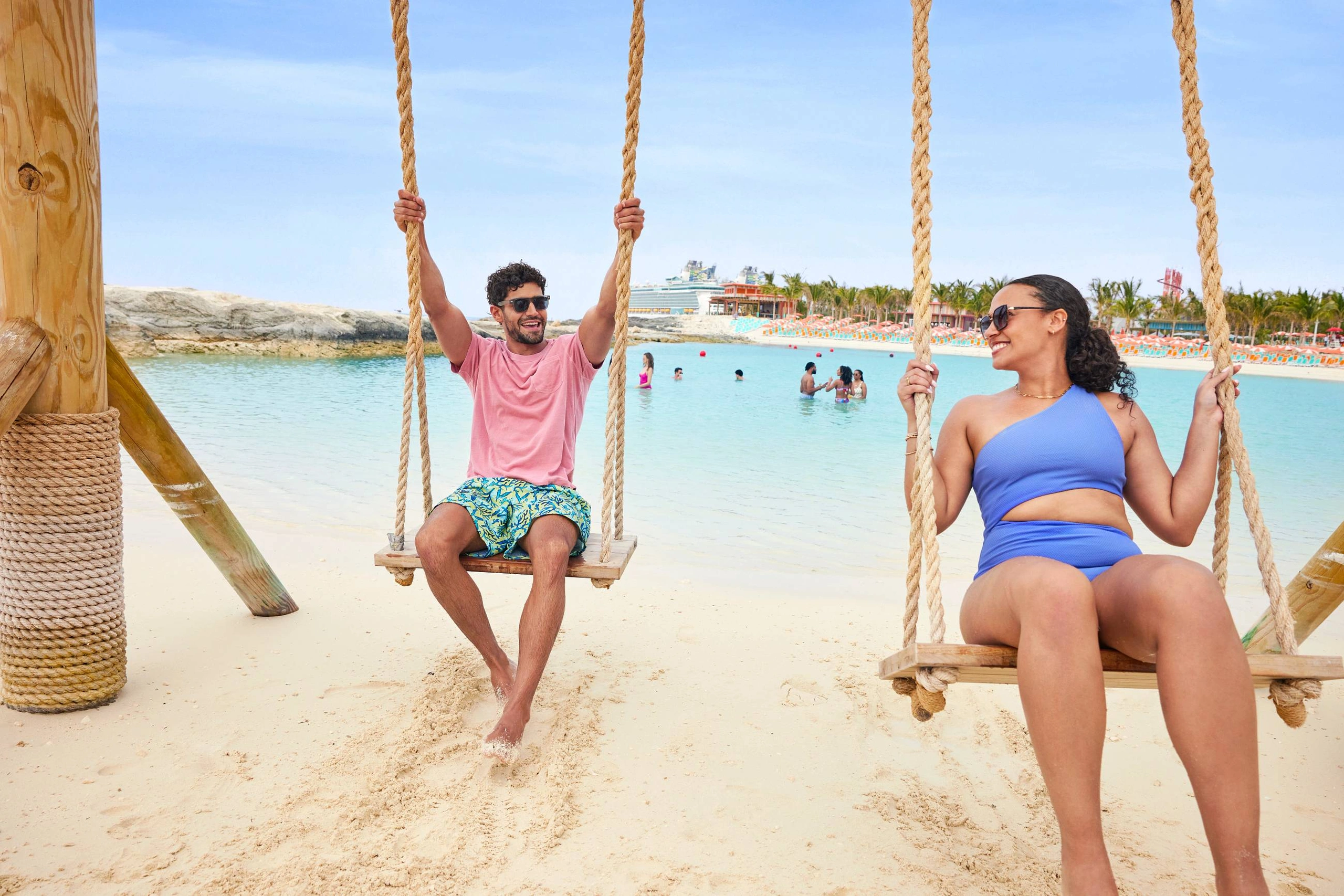 Perfect Day at CocoCay couple on swings