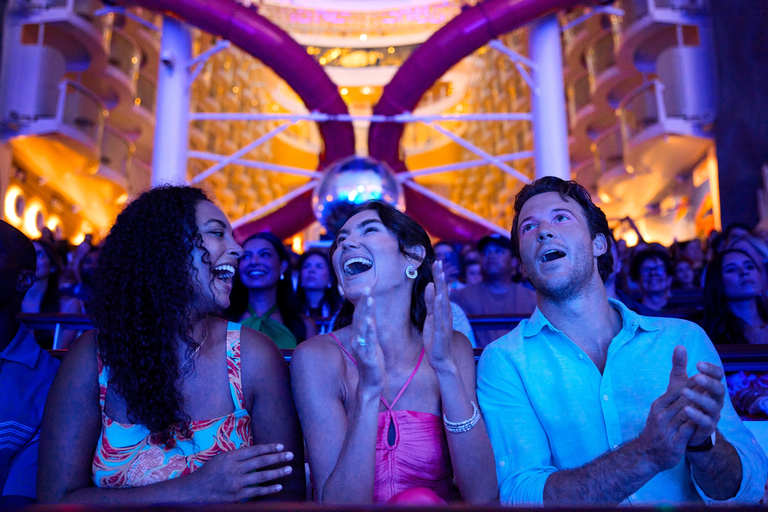 Friends laughing during aqua theater show