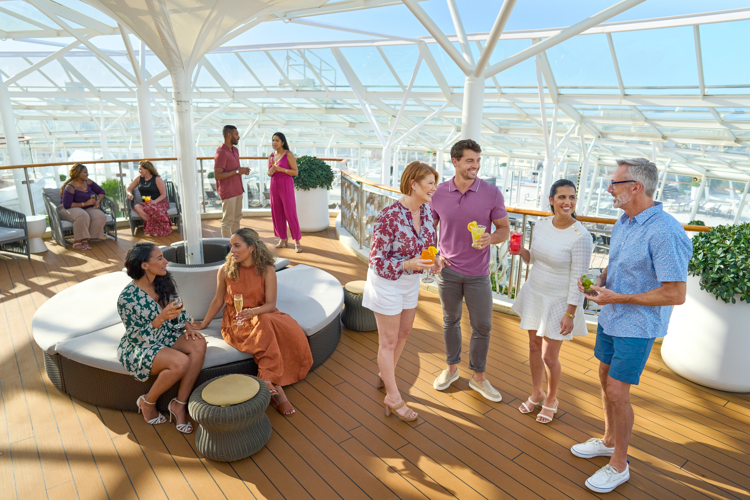 People enjoying cocktails on full ship charter