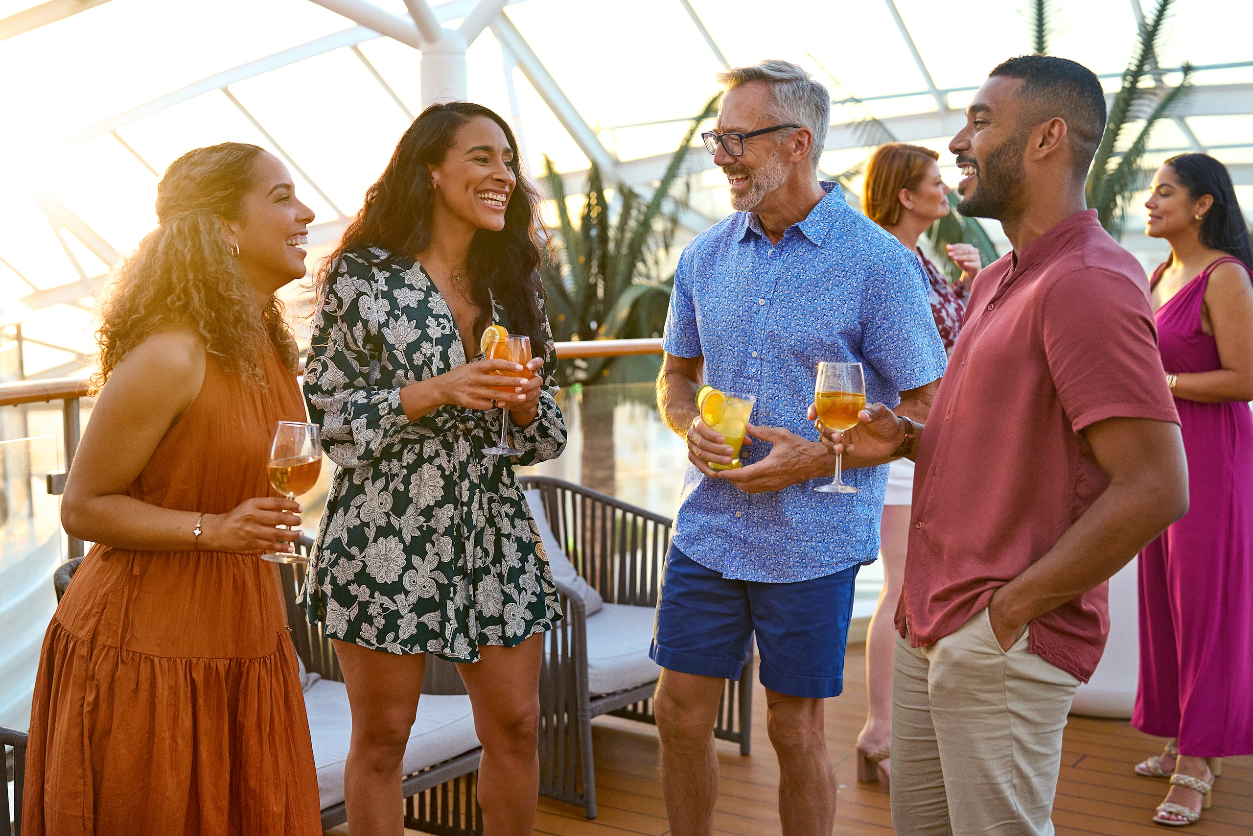 Couples chatting over drinks