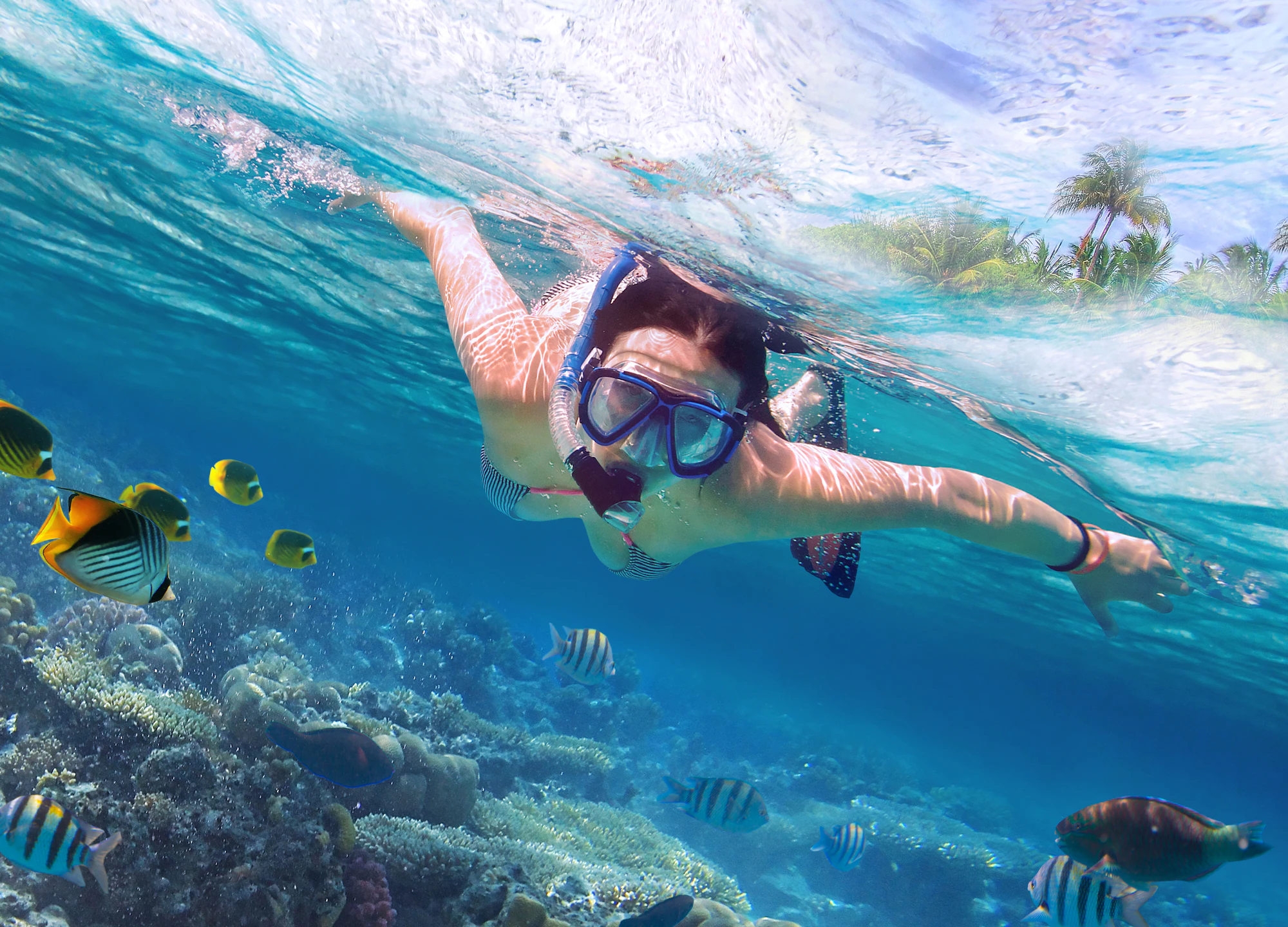 Woman snorkeling under water